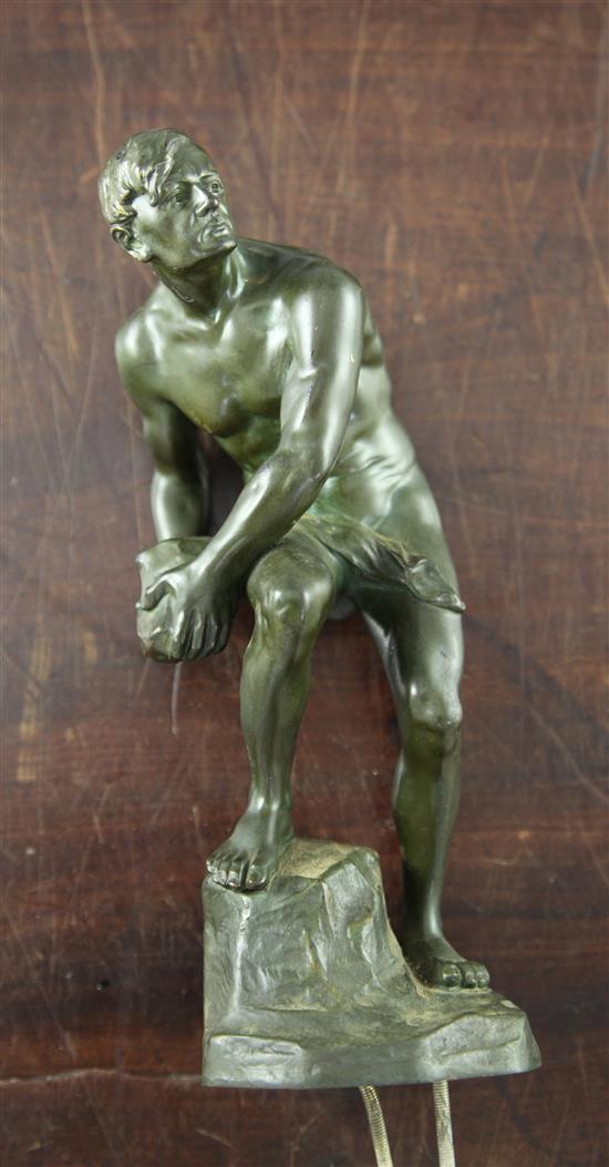 A Titze Austrian 20th century, Steinwerfer, patinated bronze of a nude male, 9in.